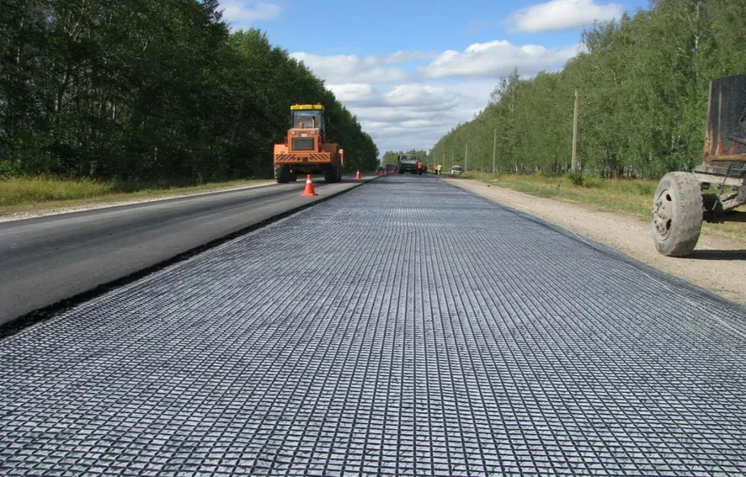 Toprak Güçlendirme/Yol İnşaatı Malzemesi için Dokunulmamış Jeotekstille Kompozit Biaxial Fiberglass Geogrid 9