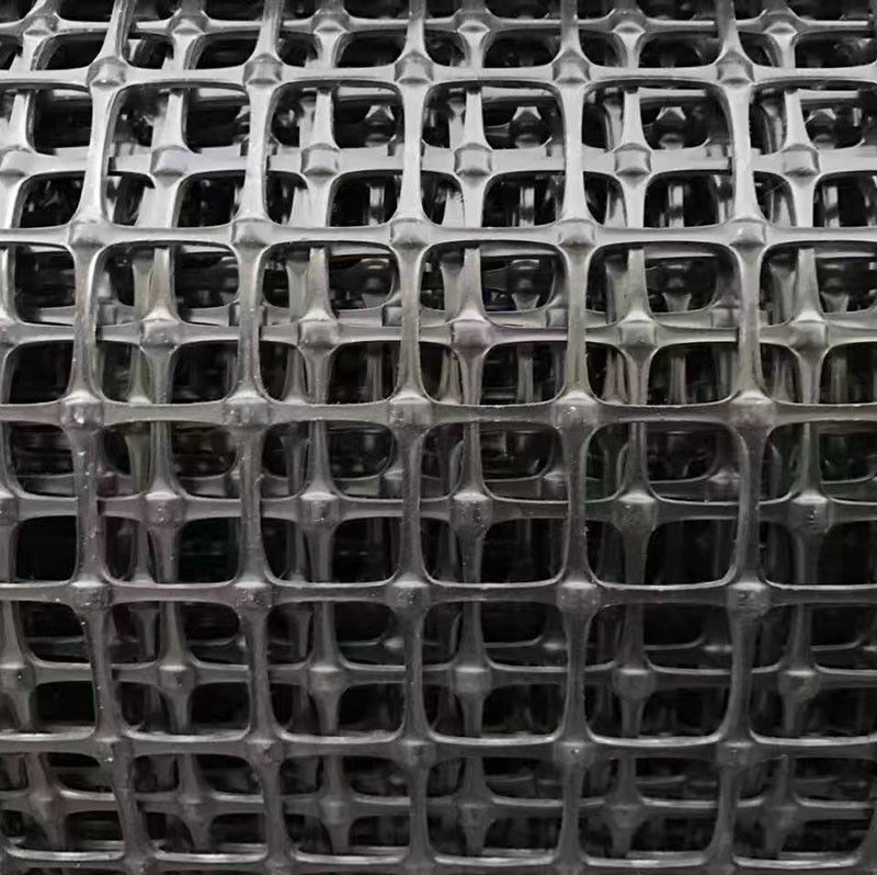 Toprağı güçlendirmek için Biaxial Plastik Geogrid, Yüksek Tensile Gücü PP/PET Geogrid,Balck 30kN/m, Yol Bazı Stabilizasyon Ağı