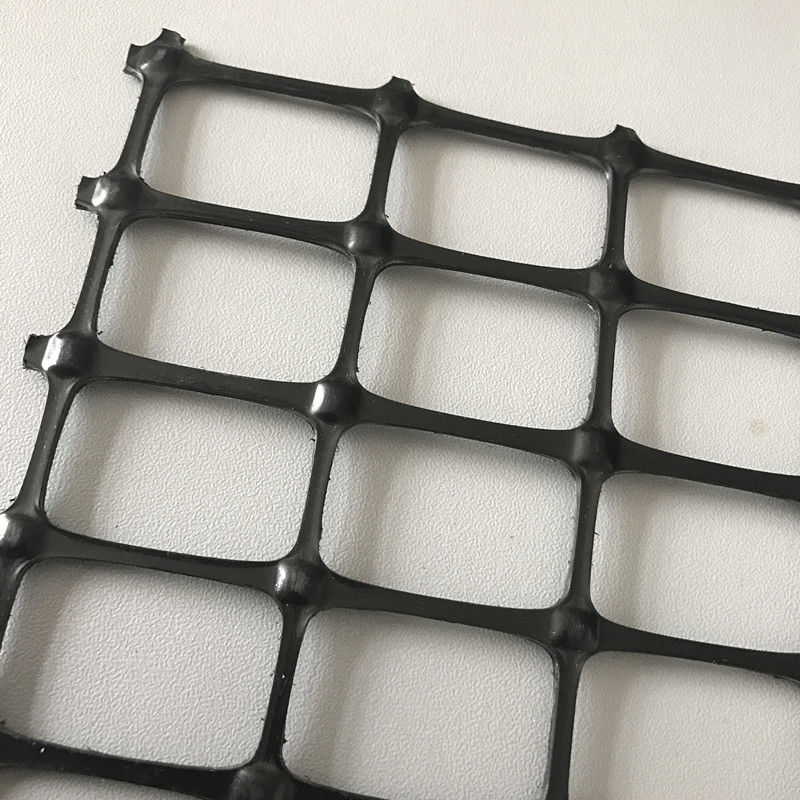 Yüksek Çekme Mukavemetli Biaxial Plastik Örgü 30kN/m Siyah PP/ PET Geogrid Toprak Güçlendirme ve Yol Tabanı Stabilizasyonu İçin